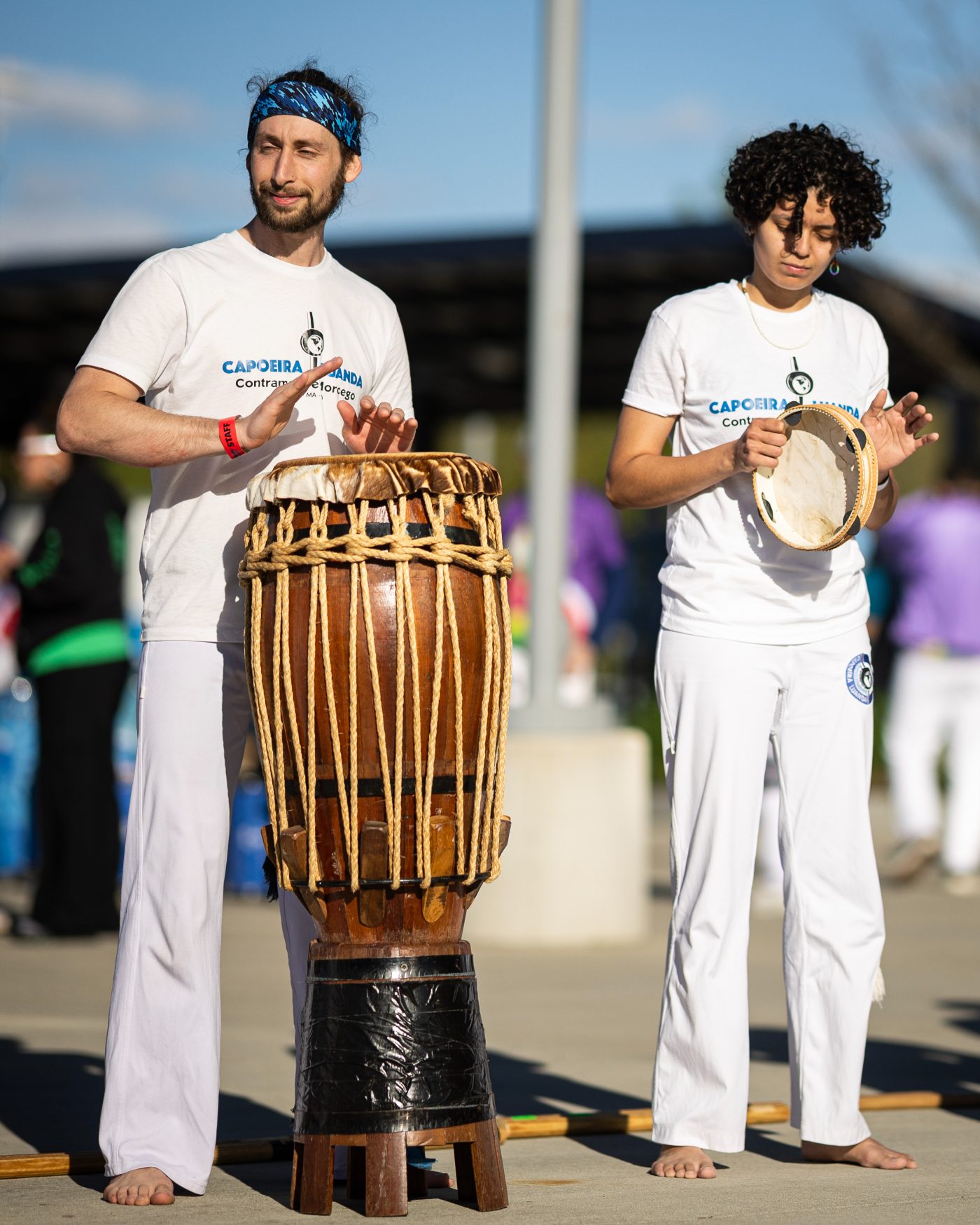 Capoeira musician playing atabaque